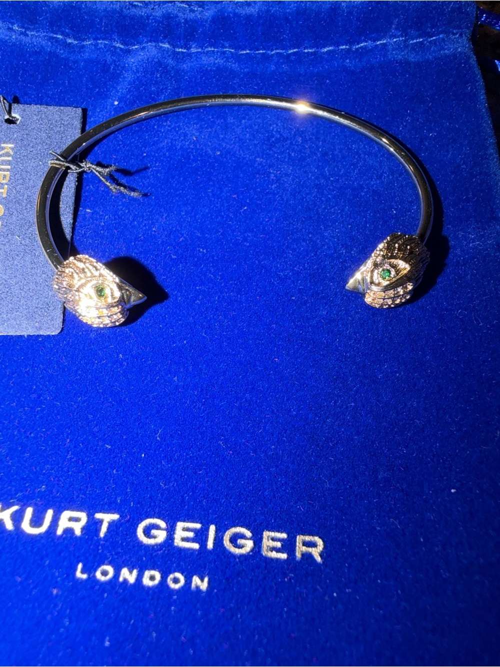 Kurt Geiger Gold-Tone Eagle Head Cuff Bracelet with Green Accents